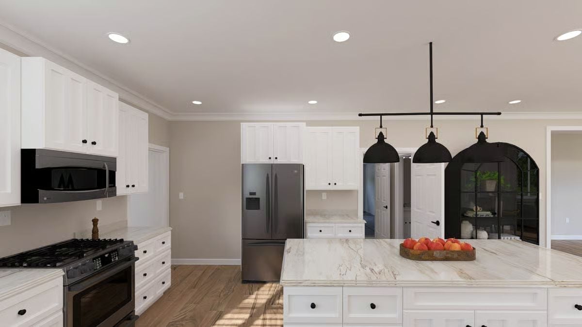 Marble Island and Black Pendants Make the Appliances Work Harder for Their Keep