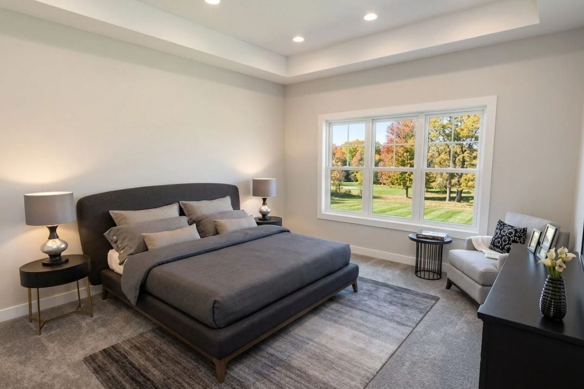 Charcoal Upholstery, a Tray Ceiling, and Views That Pull Your Eye Outside