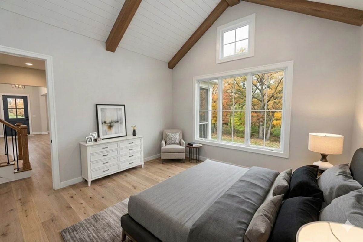Vaulted Ceiling With Exposed Beams Earns the Height Without Overcrowding the Room