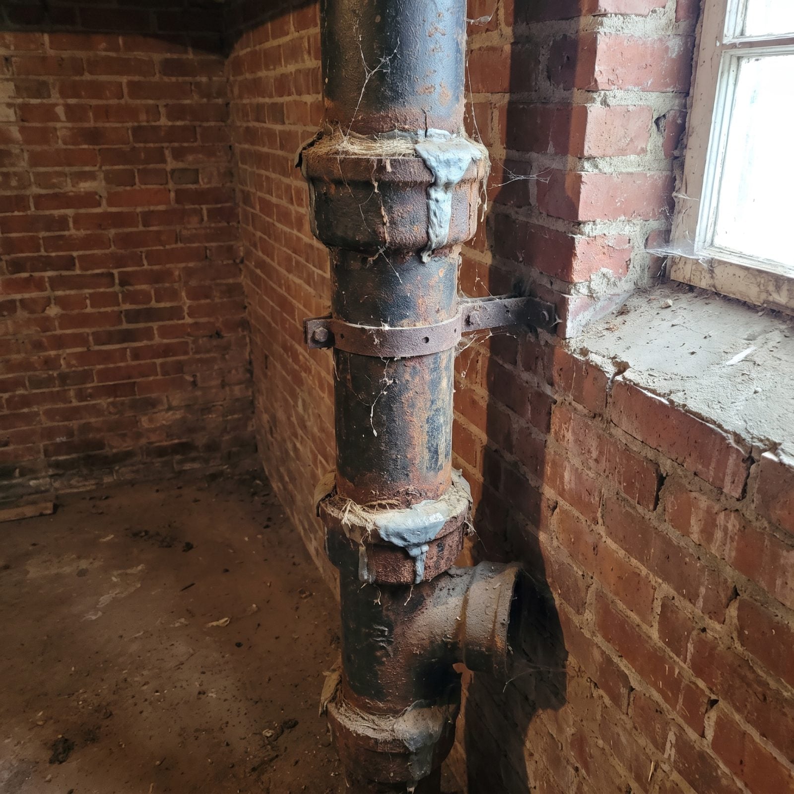 Cast-Iron Drain Stacks With Hub Joints