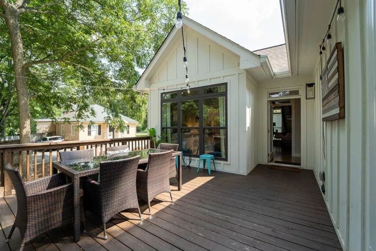 String Lights, Wicker Chairs, and a Deck That Earns Its Square Footage