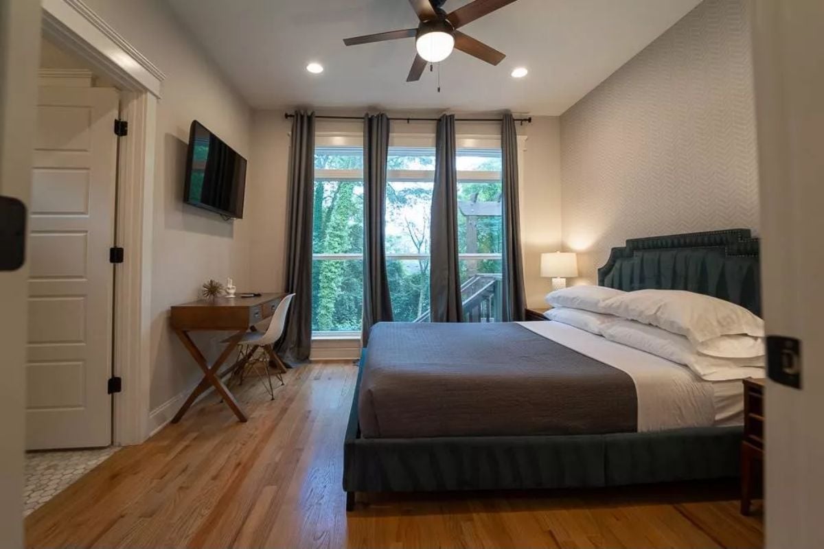 Teal Upholstered Headboard in a Room That Knows How to Slow Down
