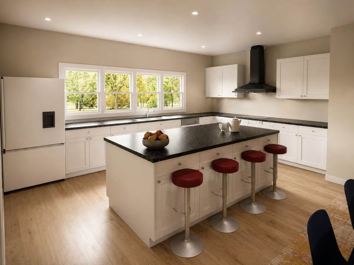 Black Granite Countertops and Red Bar Stools Make This Kitchen Impossible to Forget