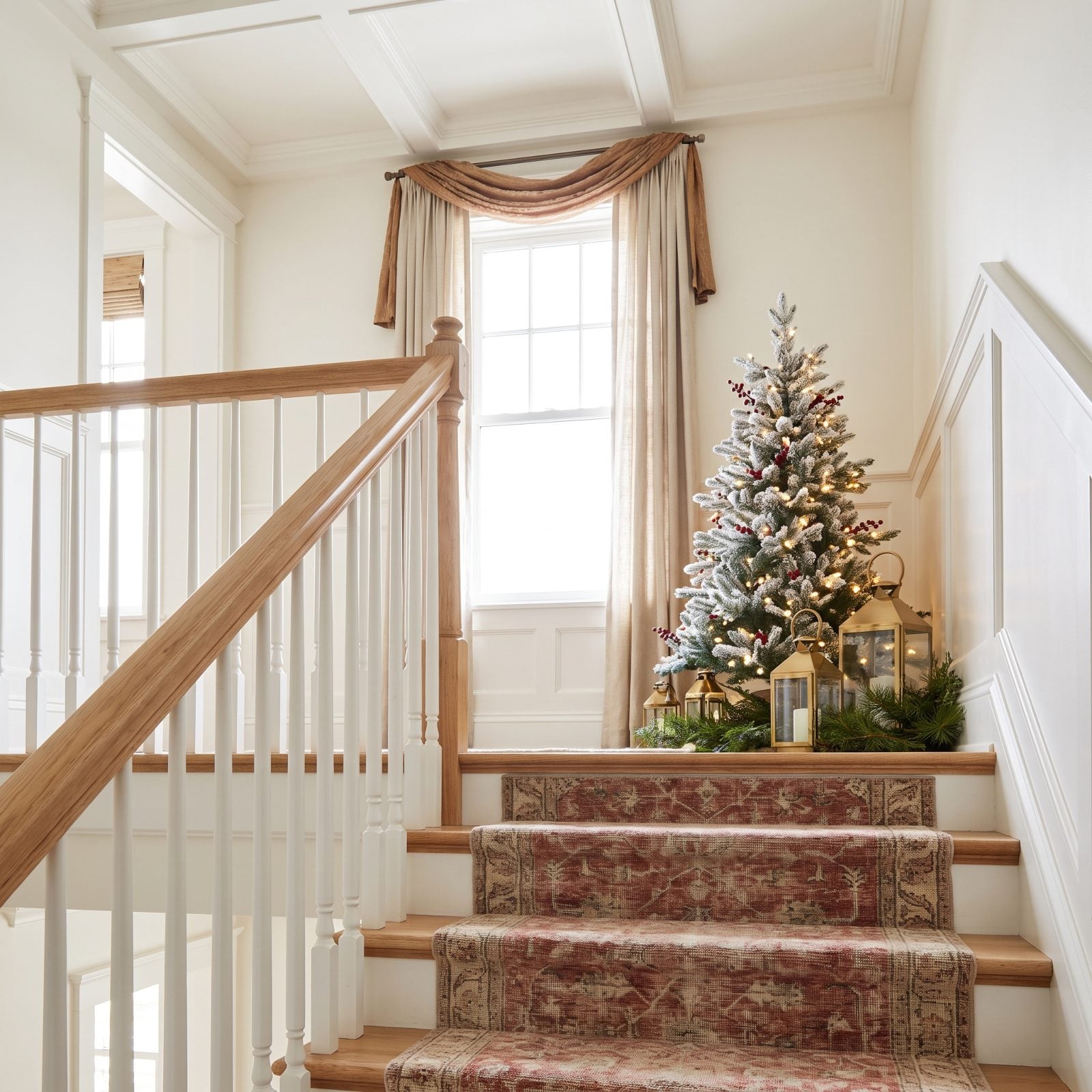 A Clean Staircase Railing Beside a Decorated Landing