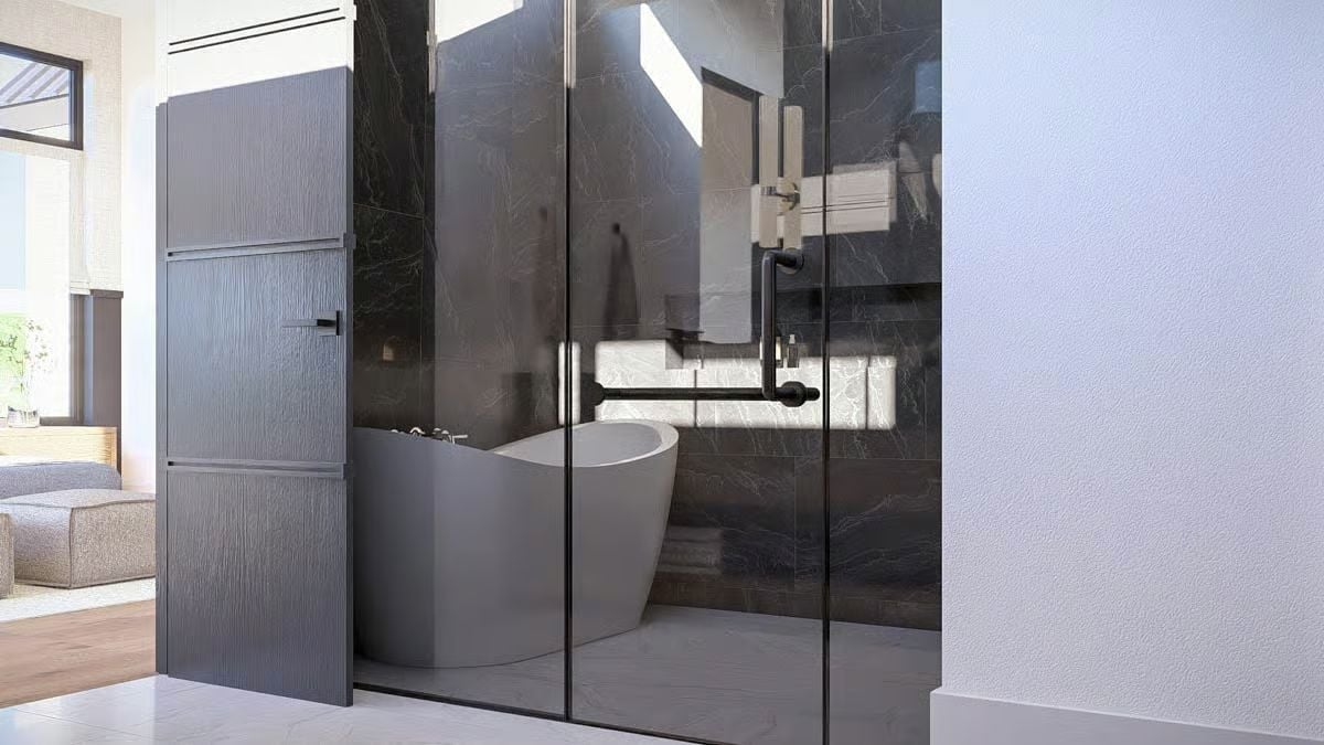 Dark Marble, Smoked Glass, and a Freestanding Tub Built for Long Evenings
