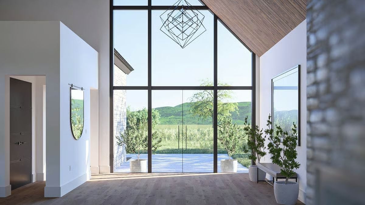 Floor-to-Ceiling Glass Turns the View Into the Main Event