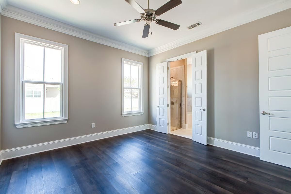 Crown Molding and Double Doors Make a Master Suite Feel Like It Earned It