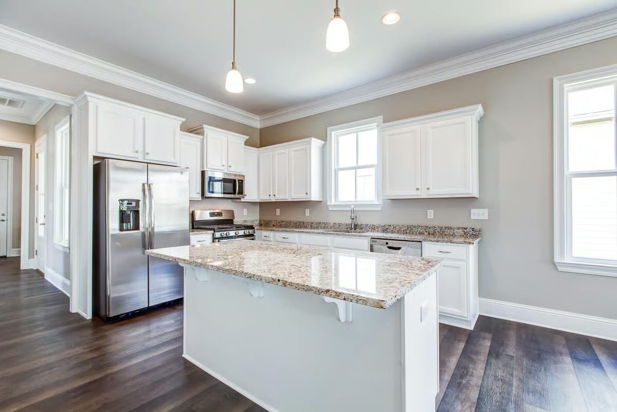 Granite Island, Pendant Lights, and White Cabinets That Don't Feel Predictable