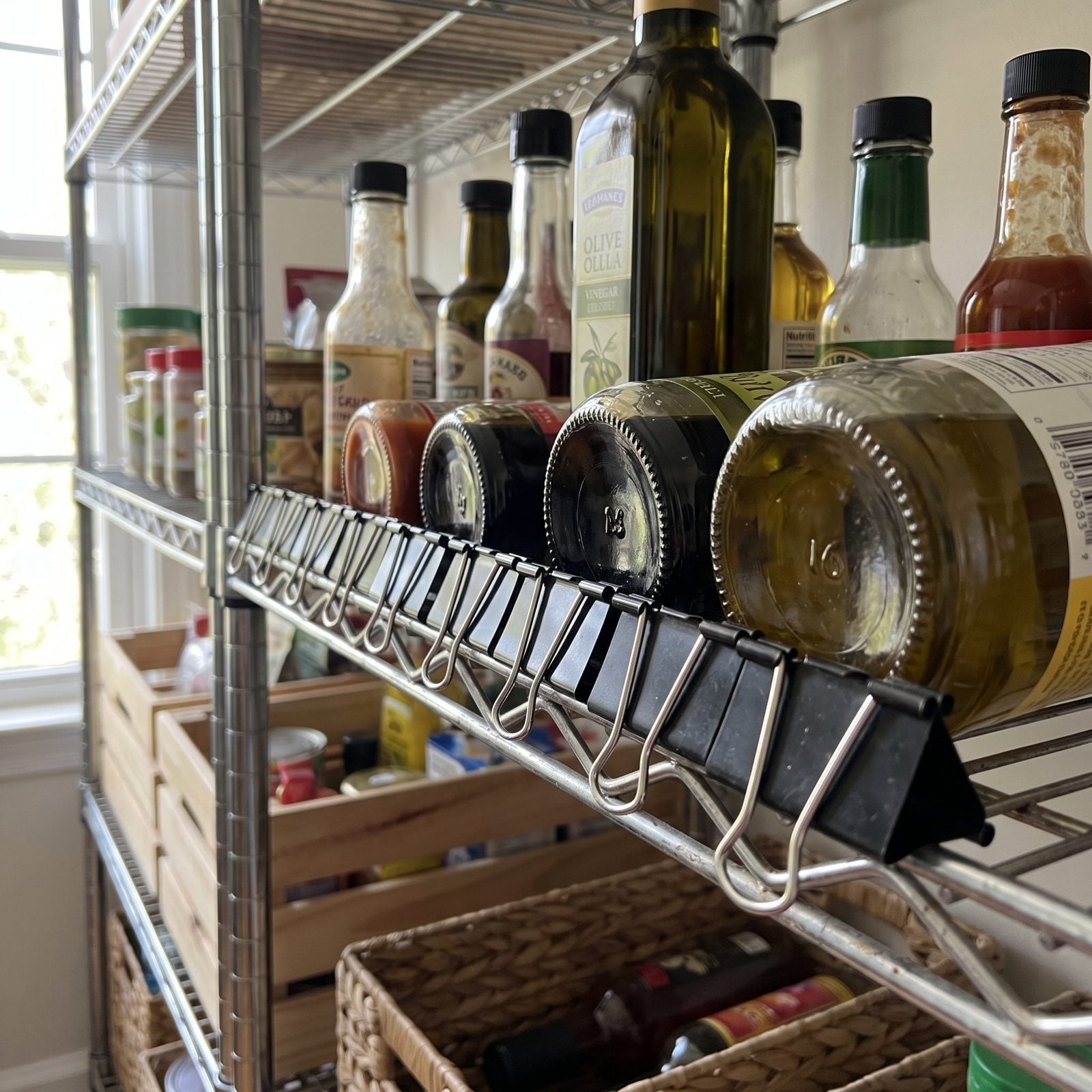 Clip Binder Clips to Wire Shelves to Stop Bottles From Rolling