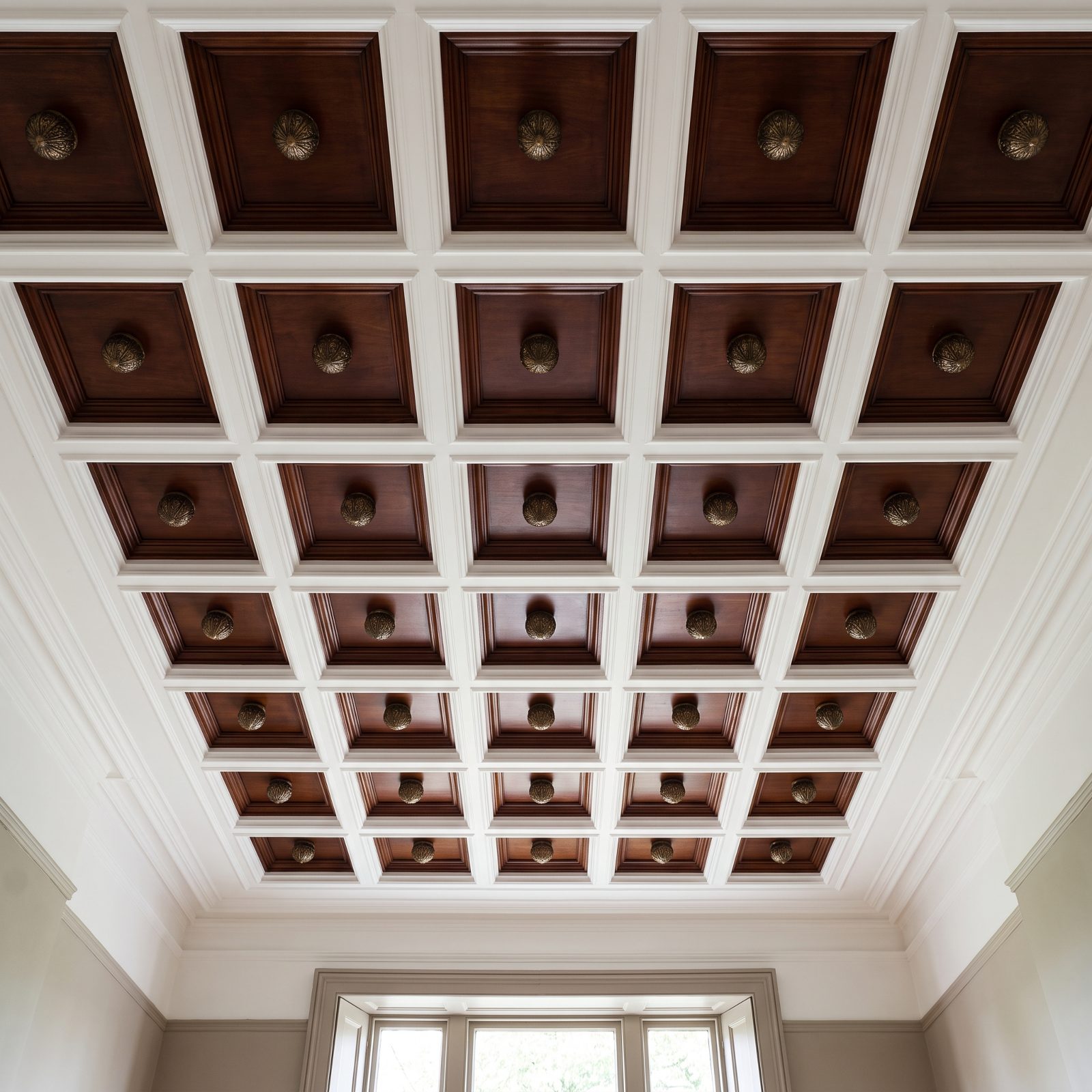 A Coffered Ceiling With an Ornament Inside Every Panel