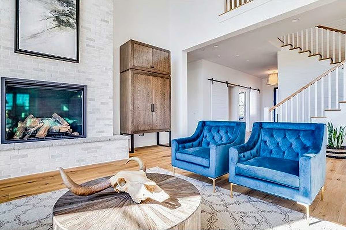 Blue Velvet Chairs and a Longhorn Skull That Set the Tone Early