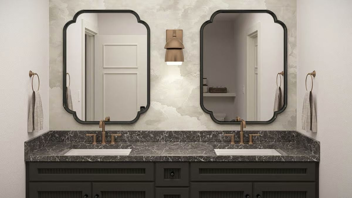 Scallop-Frame Mirrors and Brass Fixtures Justify Every Dollar of the Rent