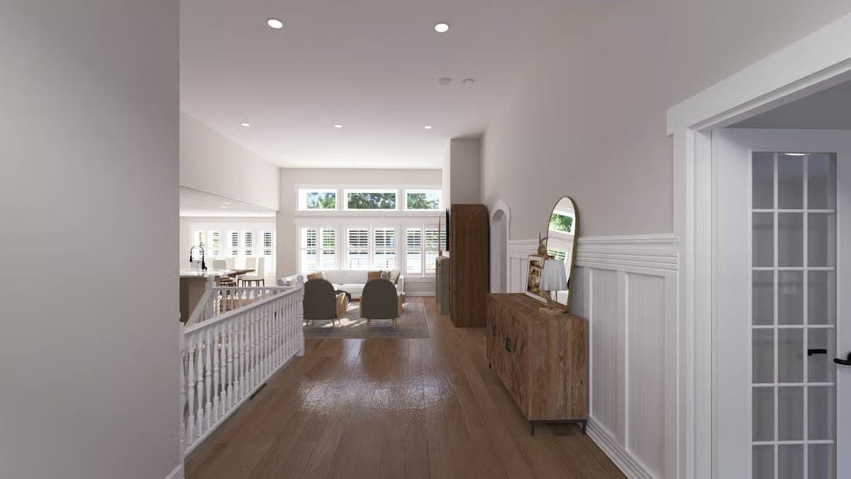 Hallway Landing with Wainscoting Opens Into the Main Living Wing