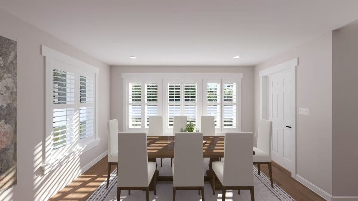 Plantation Shutters and a Farmhouse Table Built for Eight Define This Dining Room