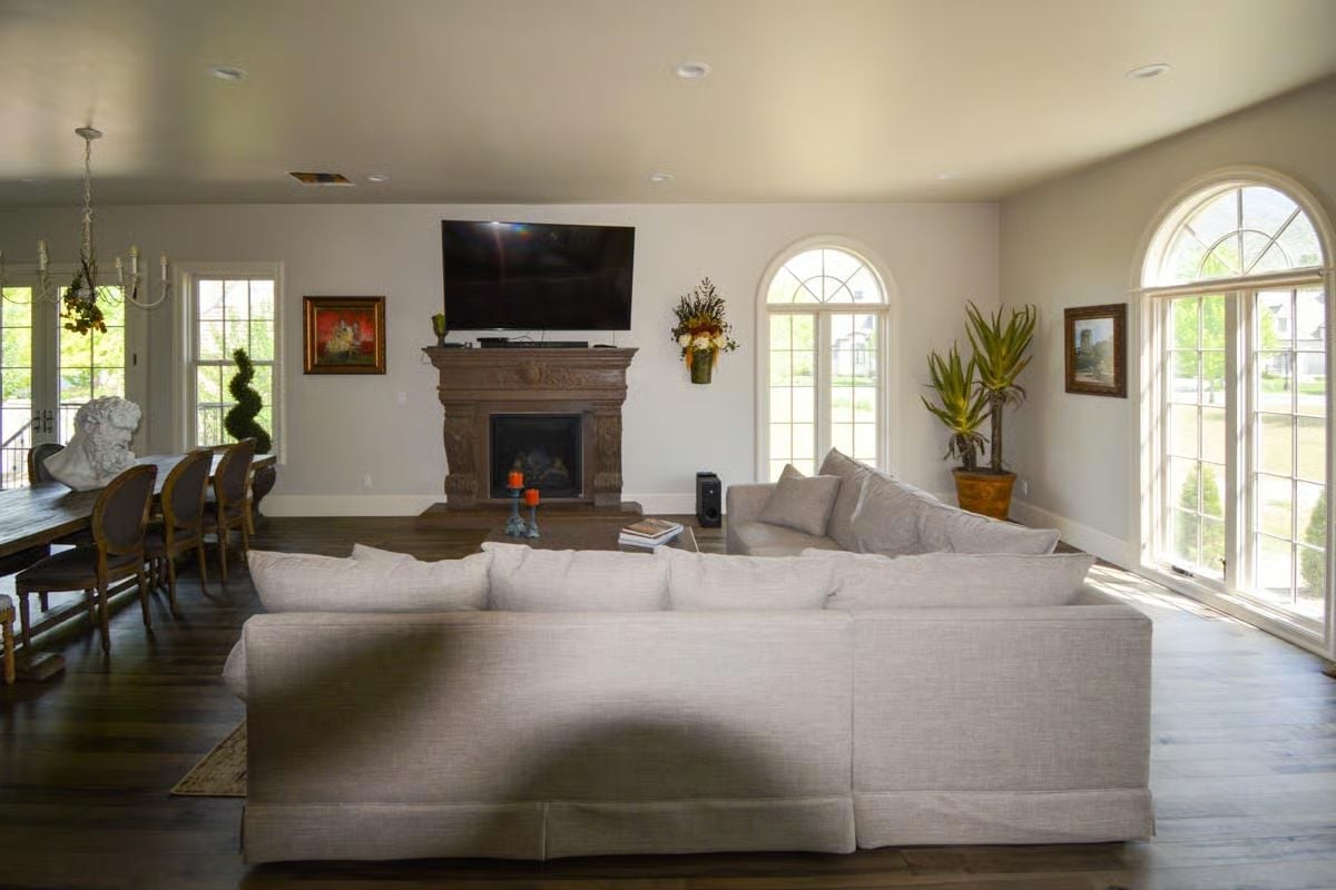 Ornate Fireplace Mantel Doing the Heavy Lifting in an Open-Plan Room