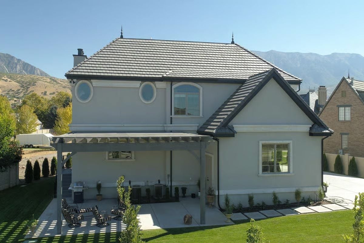 Oval Windows and a Hip Roof That Earns Every Inch of Curb Appeal