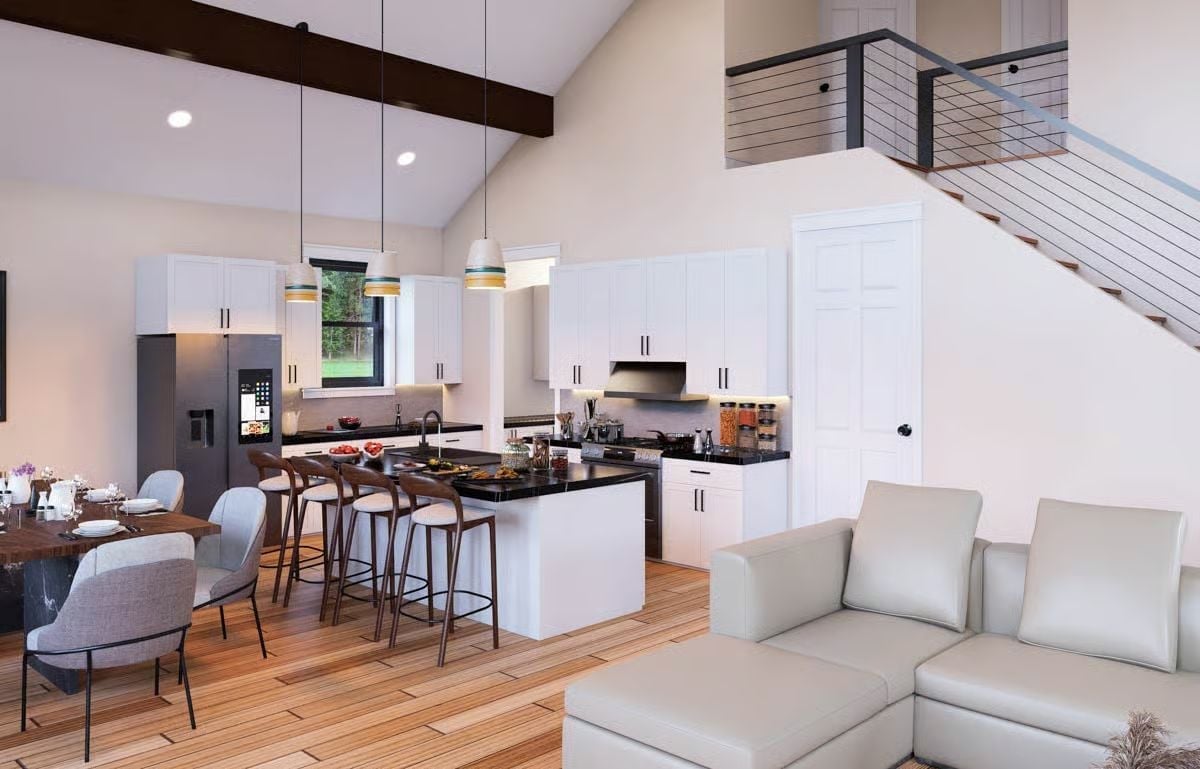 Black Countertops and White Shaker Cabinets Keep the Kitchen Grounded