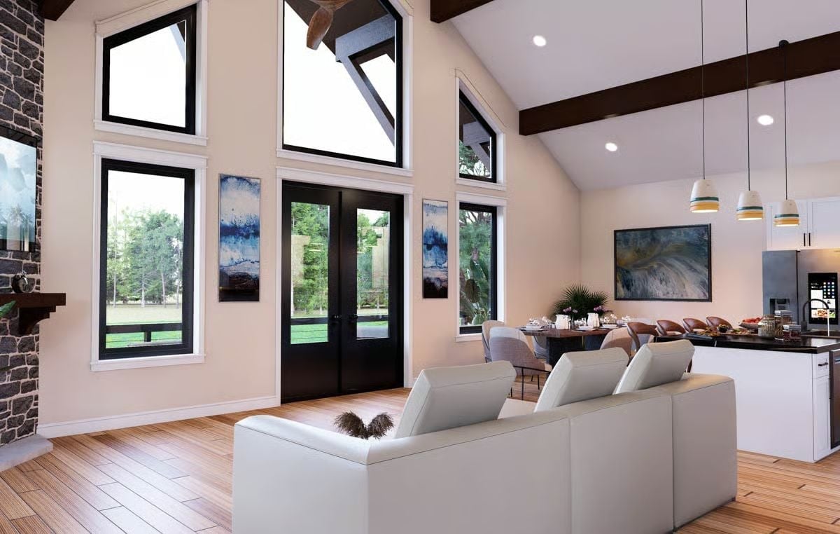 Vaulted Ceilings and Black-Frame Windows Pull the Outdoors Right Into the Room