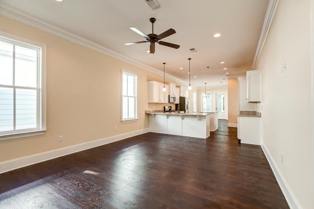 Dark Hardwood Floors and Open-Concept Flow Worth Building Around