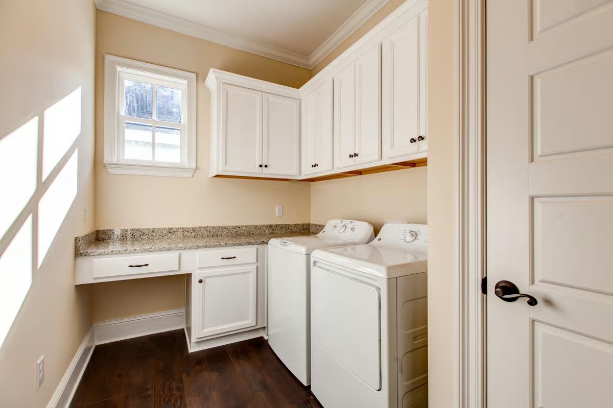 Granite Counters, Built-In Cabinetry, and a Laundry Room That Actually Functions