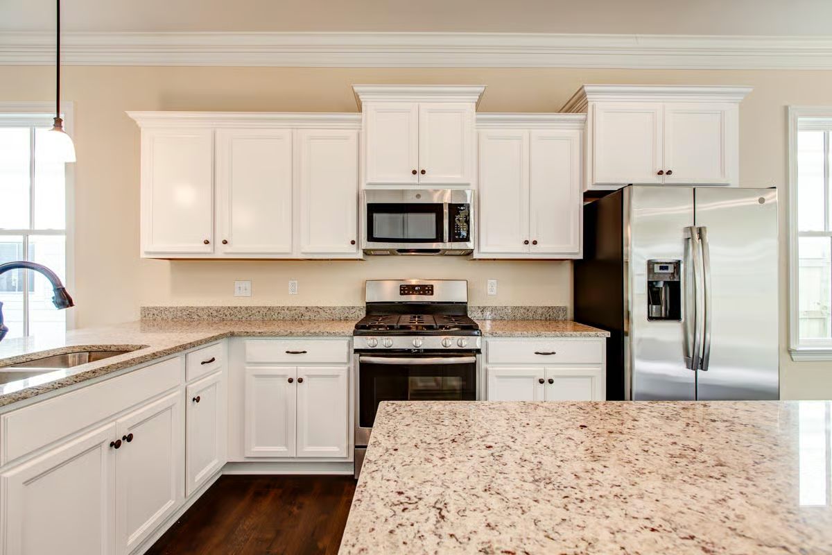 White Cabinets and Granite That Earn Their Classic Reputation