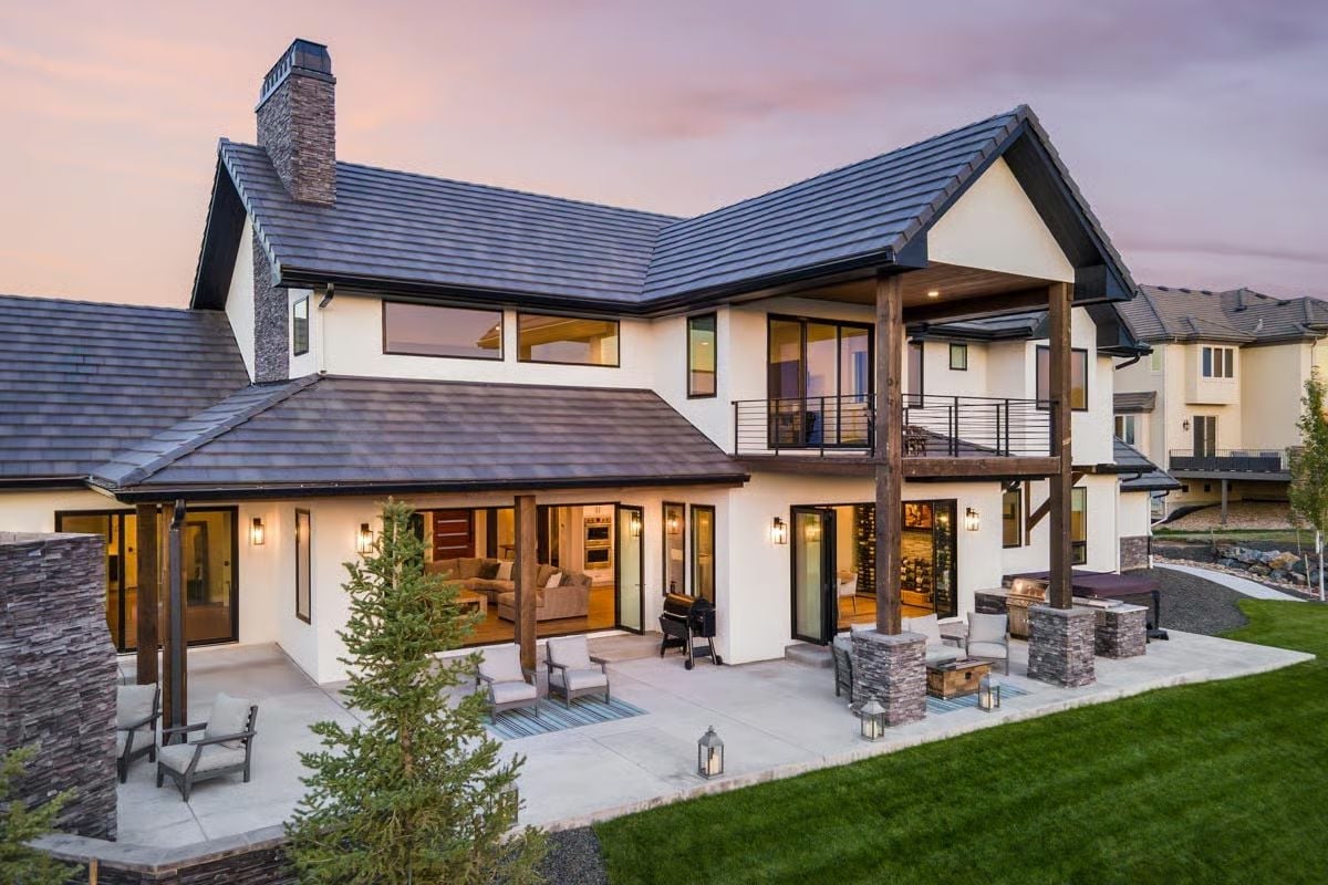 Covered Patio With Timber Posts and a Fire Pit Built for Mountain Evenings