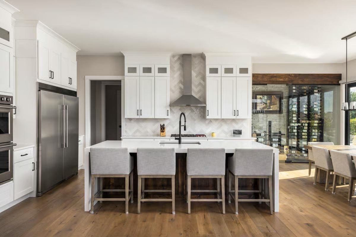 Herringbone Backsplash and a Glass Wine Cellar Hiding in Plain Sight