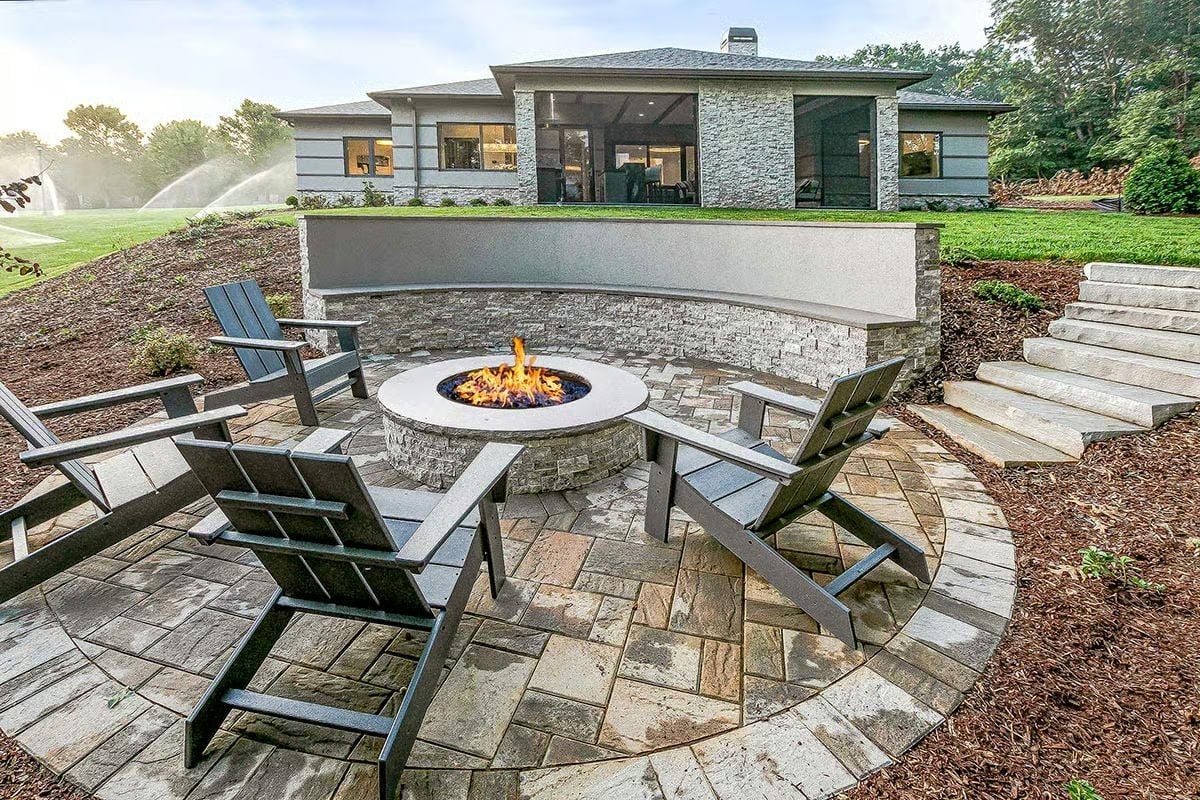 Curved Stone Wall, Fire Pit, and Five Chairs That Mean Business