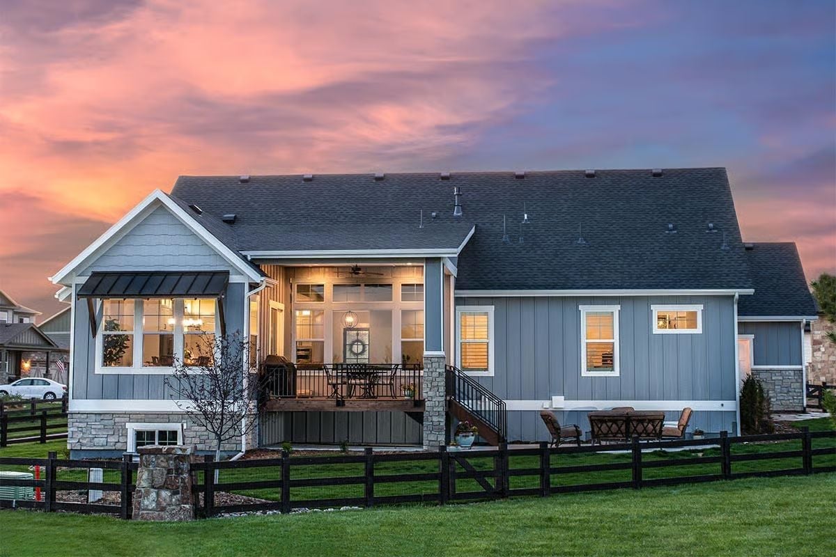 Dusk Light Does the Heavy Lifting on This Board-and-Batten Exterior