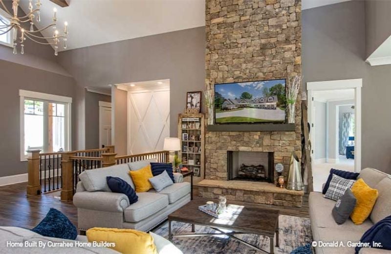 Floor-to-Ceiling Stone and a TV That Somehow Belongs There
