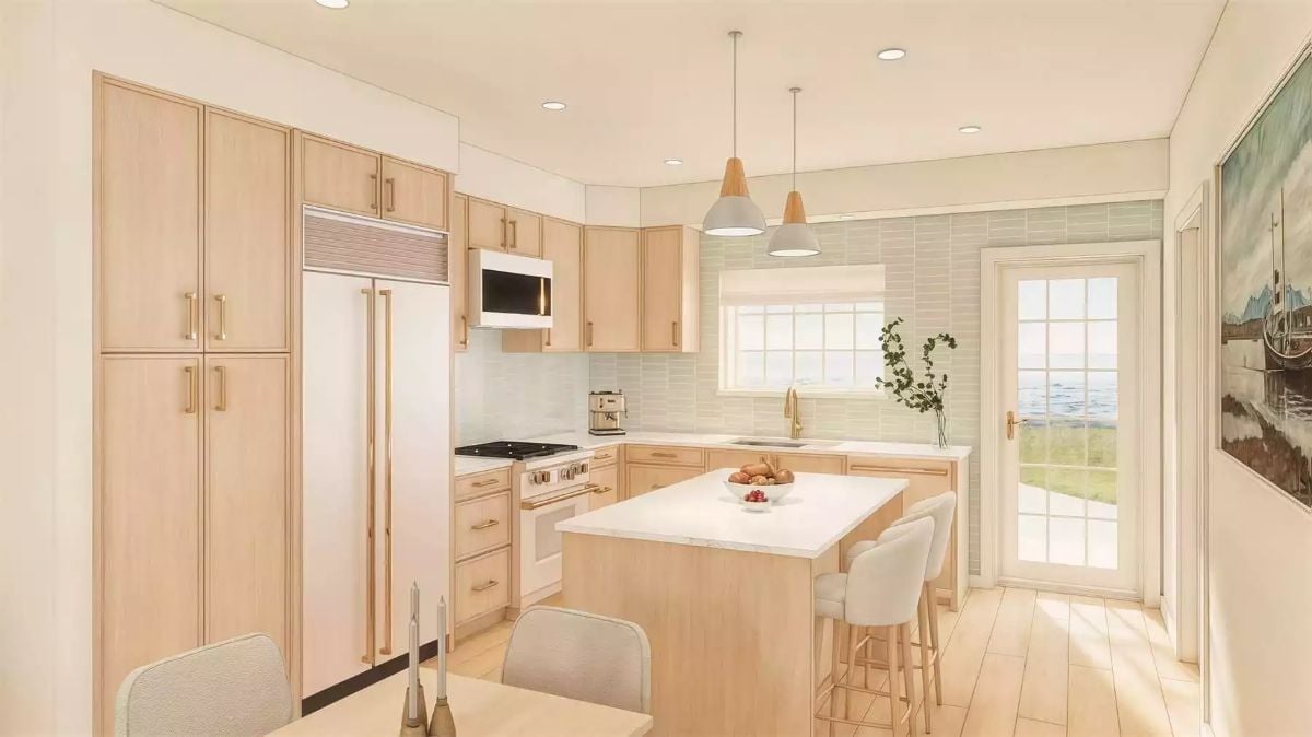 Light Wood Cabinetry and Sage Tile Make This Kitchen Feel Like a Coastal Getaway