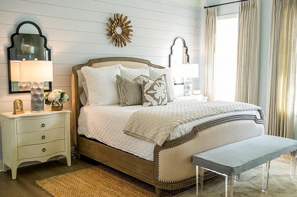 Shiplap, a Sunburst Mirror, and a Bed Frame That Does the Heavy Lifting