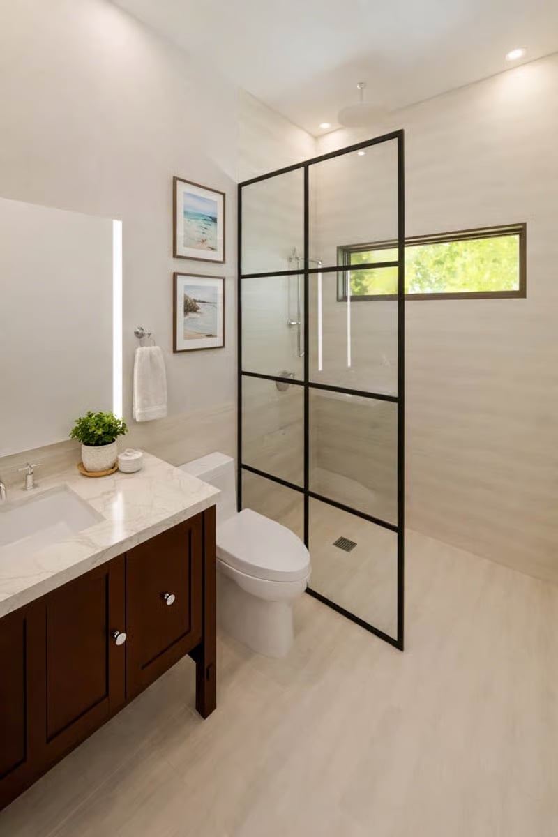 Steel Grid, Wood Vanity, and a Shower Built Around Natural Light