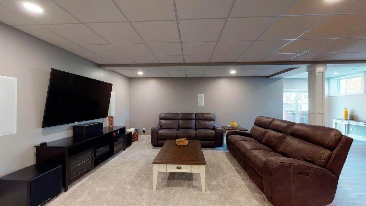 Leather Recliners, a Wall-Mounted TV, and Basement Space That Actually Gets Used