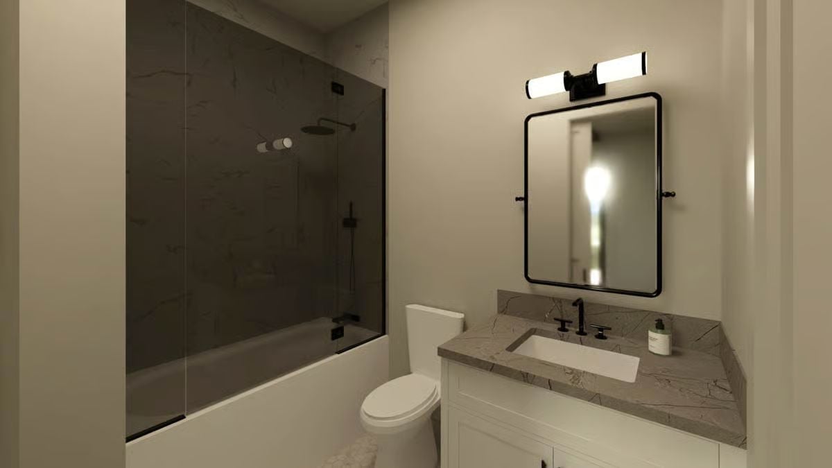 Marble Counters, Black Hardware, and a Shower That Gets Straight to Business