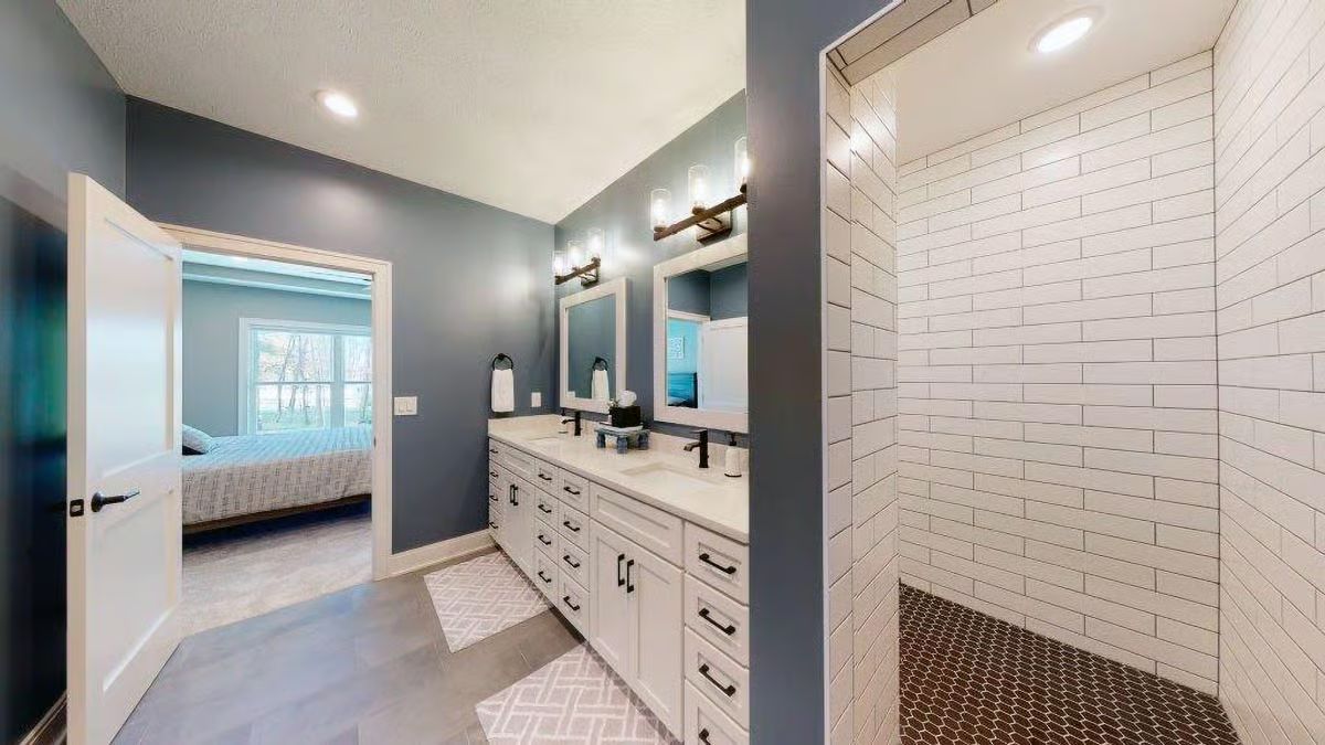 Slate Blue Walls, Double Vanity, and a Walk-In Shower That Skips the Door