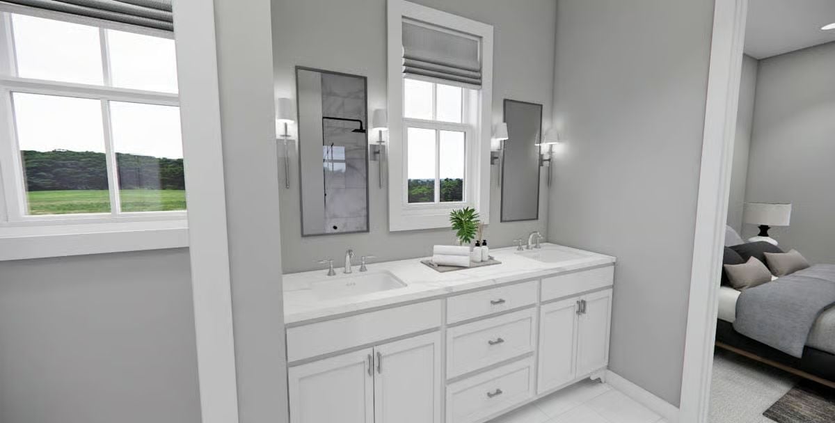 Double Sinks, Chrome Hardware, and Natural Light Doing Most of the Work