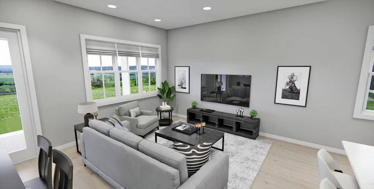 Gray Sectional, Candle Clusters, and a TV Wall That Doesn't Overpower the Room