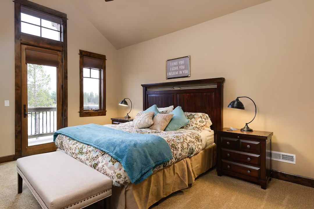 Warm Wood Tones and a Teal Throw That Actually Belong Together