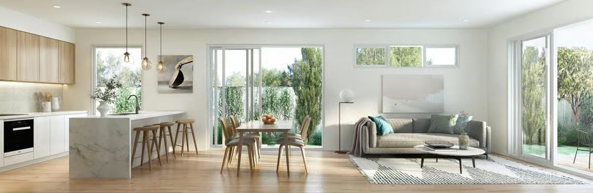 Marble Island, Warm Wood, and a Back Garden That Pulls the Whole Room Outward