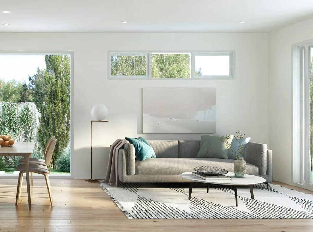 Soft Gray Sofa, Teal Cushions, and a Floor Lamp That Actually Earns Its Spot