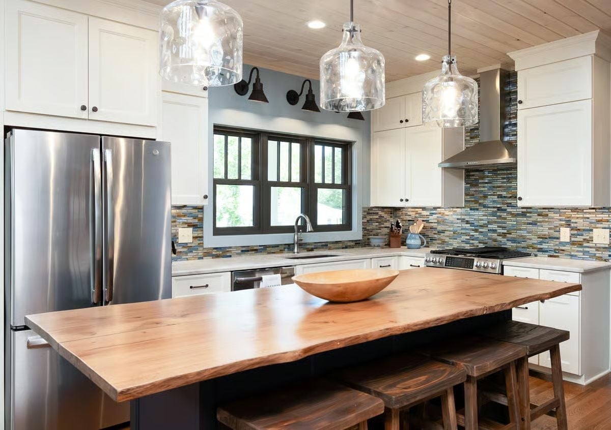 Live-Edge Island Countertop Anchors a Kitchen Built Around Natural Wood