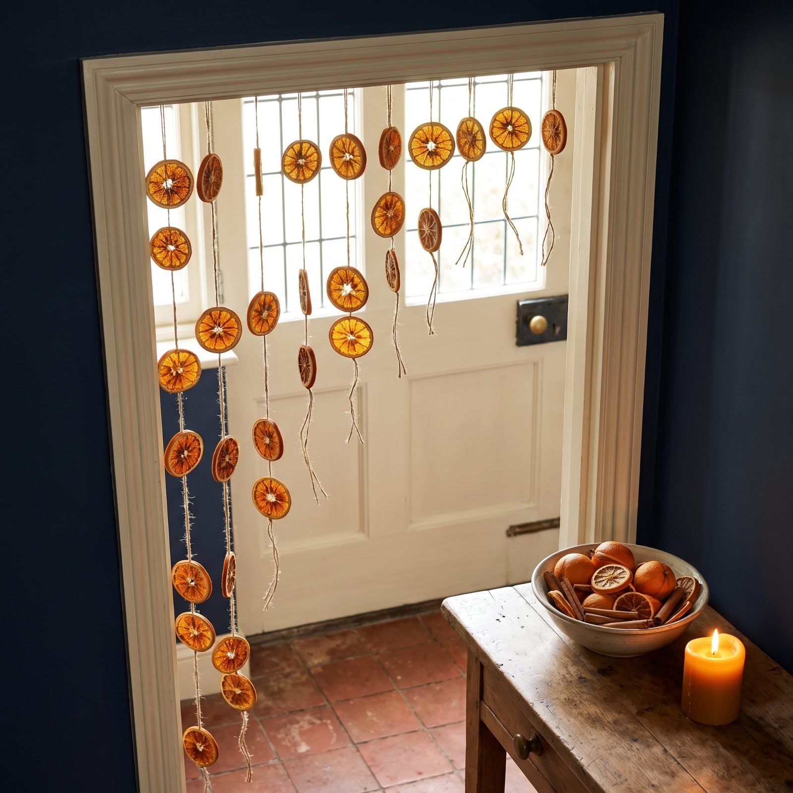 Dried Orange Slices Strung in Vertical Lines