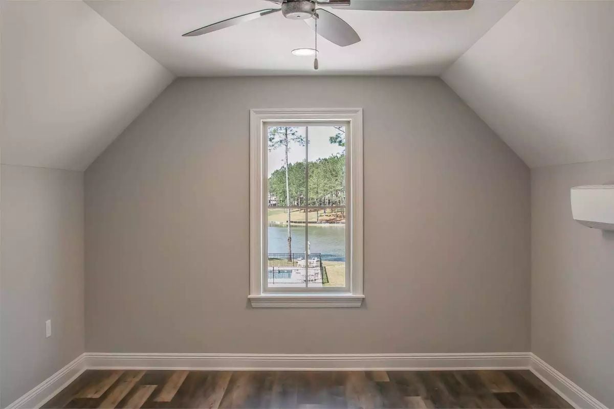 Vaulted Bonus Room With a Water View That Does Half the Decorating