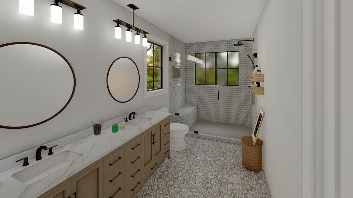 Subway Tile Shower, Round Mirrors, and Faucets That Don't Pretend to Be Simple