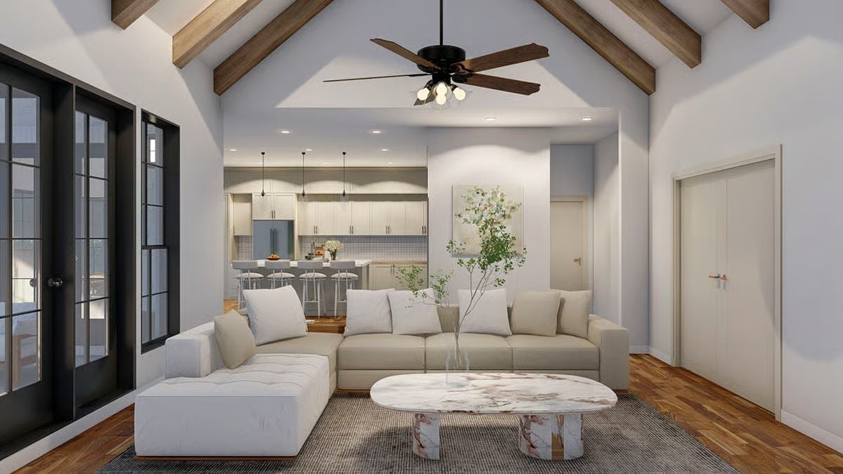Cathedral Ceiling with Timber Beams Sets the Tone for Every Room Beyond It