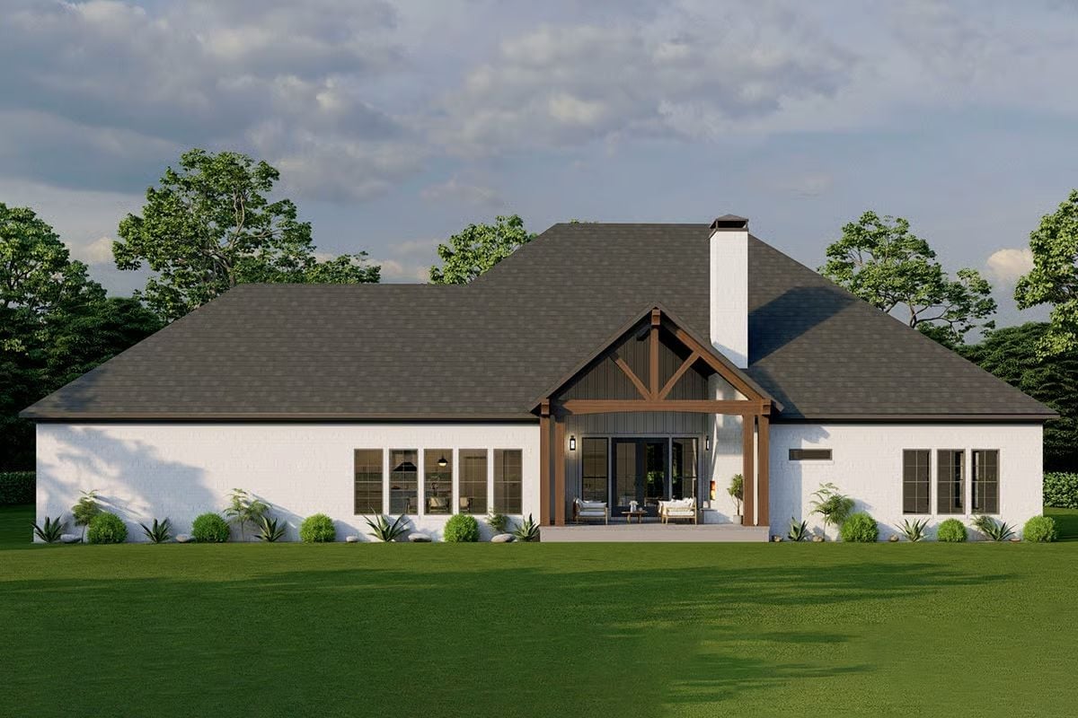 Warm Timber Trusses Pull the Whole Back Elevation Together