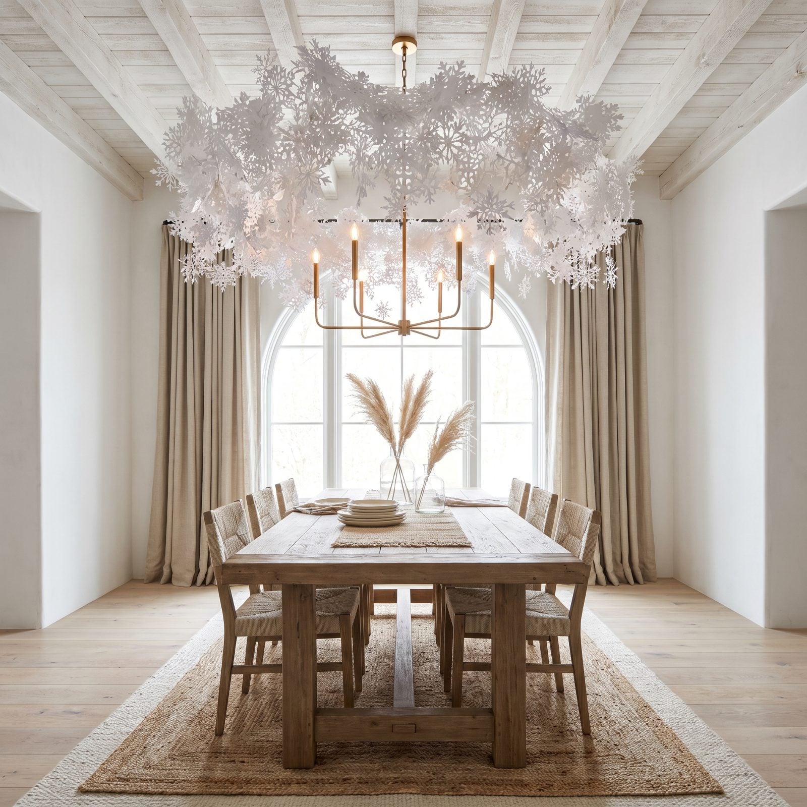 A Flax-Toned Dining Room Beneath a Cloud of Paper Snowflakes