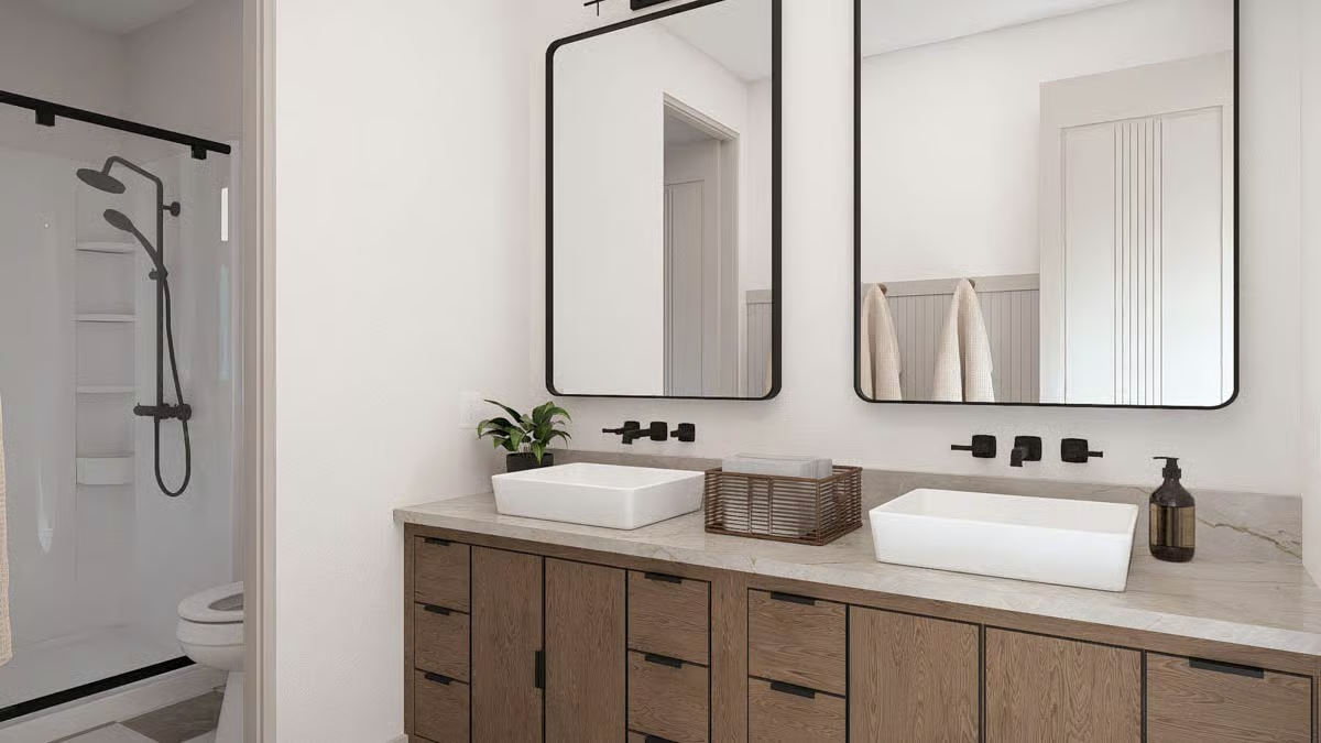 Vessel Sinks, Wall-Mount Faucets, and a Vanity That Pulls Its Weight