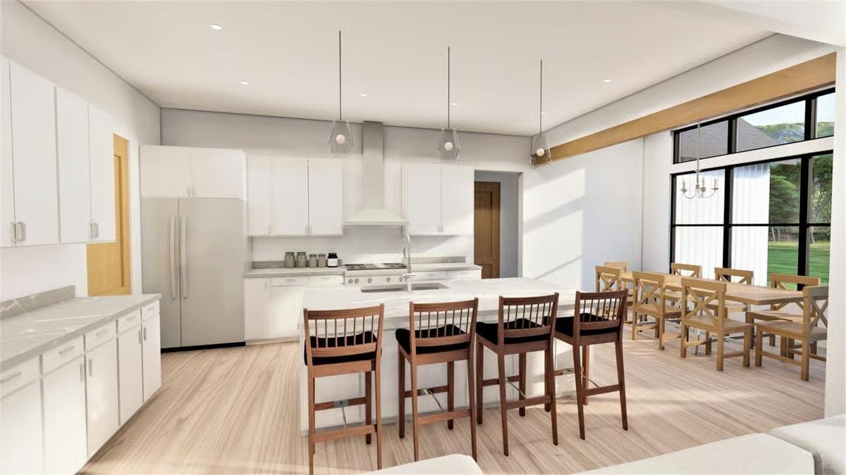 Open Kitchen Layout Where the Island Does Most of the Heavy Lifting
